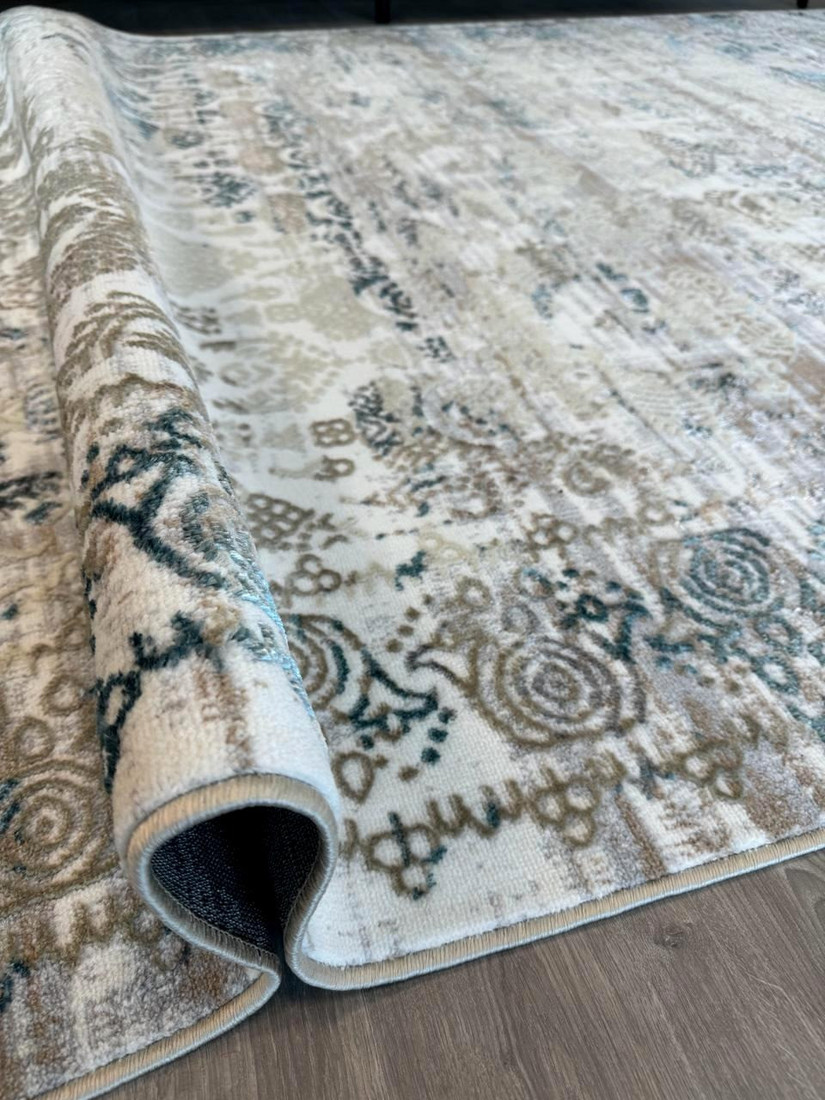 Ковер для жилой комнаты Radjab Carpet Бьянка Прямоугольник D008A 8779RK-B (0.8x1.5, Cream Shirink/Blue Fdy)