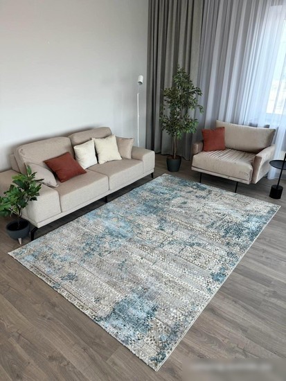 Ковер для жилой комнаты Radjab Carpet Бьянка прямоугольник D057A 7584RK-b 1.6x2.3 (cream shirink/blue fdy)