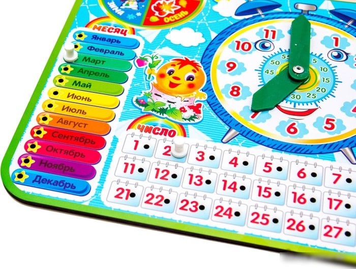 Развивающая игрушка WoodLand Toys Часы-календарь 4 094104